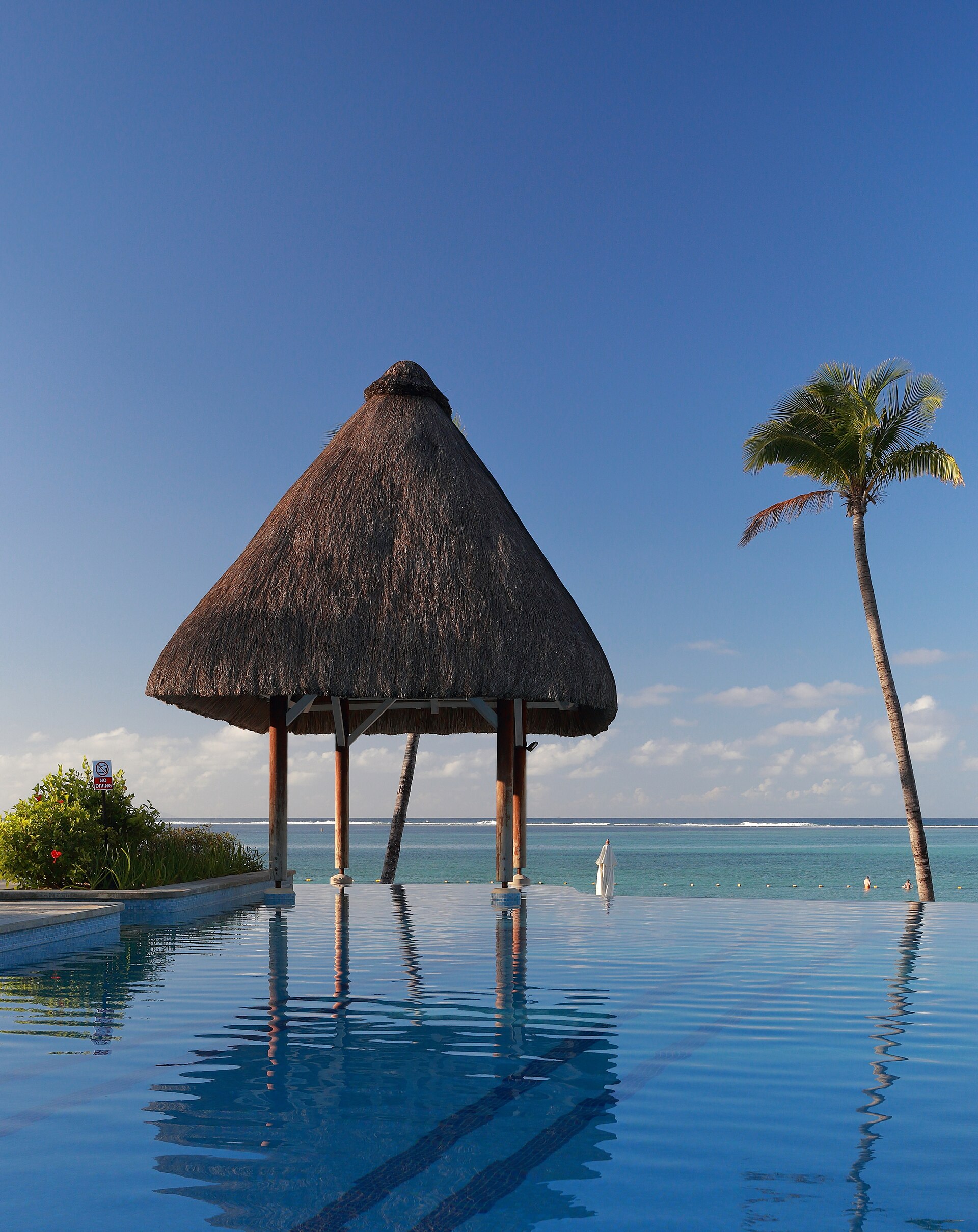 Infinity pool overlooking the ocean at a luxury resort